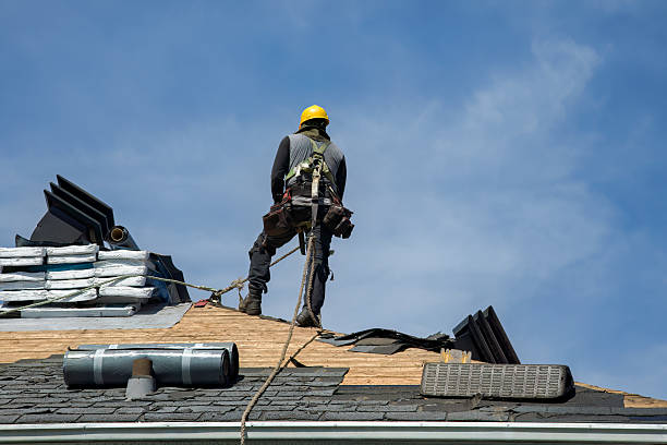 Professional Roofing technician working in Cedarhurst, NY
